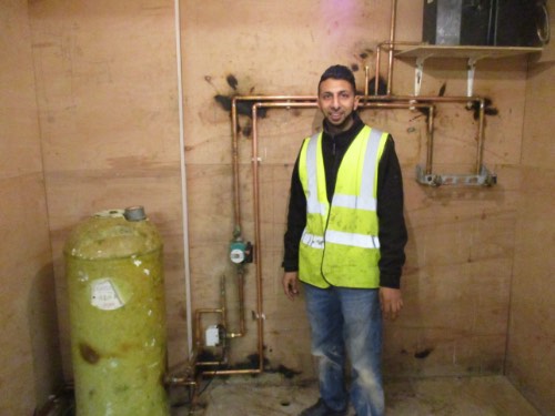 gent installing a heating system during his plumbing course in stoke-on-trent