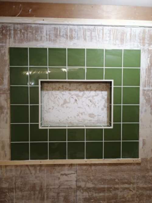 tiles fixed around a window with tiling trim