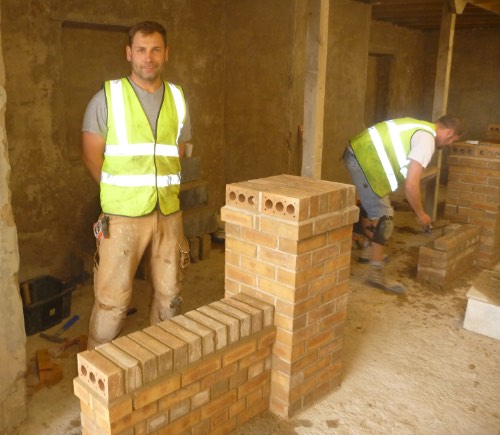 wall and attached pillar built by person from manchester on a bricklaying course